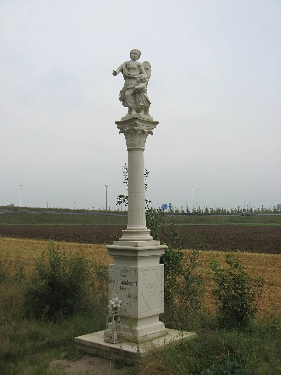 Obrázok: Buchhändler · CC BY-SA 3.0 Schutzengelkreuz in Unterlaa