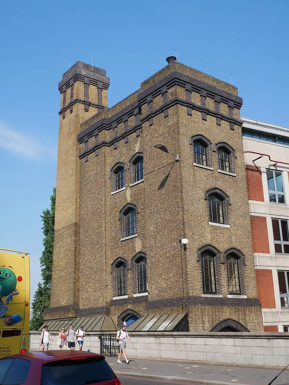 Accumulator Tower And Chimney Stack To East Side Of Tower Bridge Approach