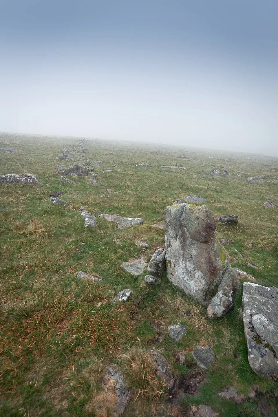 Length of boundary wall and seven stone hut circles forming part of a large enclosure north-east of Ger Tor