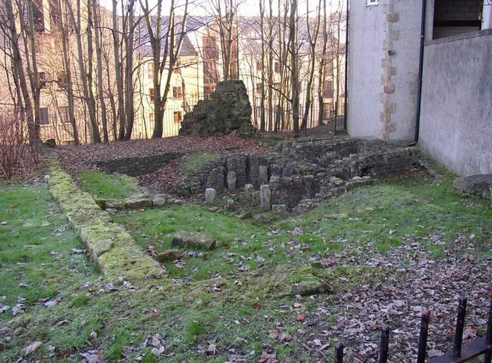 Part of a Roman fort and its associated vicus and remains of a pre-Conquest monastery and a Benedictine priory on Castle Hill