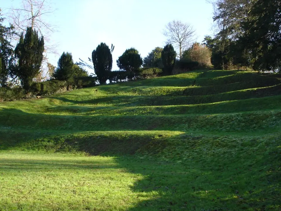 The Moot: a ringwork and bailey, earlier Roman settlement remains and later garden earthworks immediately east of the River Avon